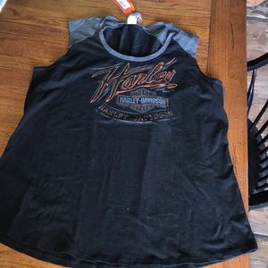 Harley Davidson sleeveless shirt.
